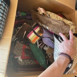 Various Coach purses and wallets
